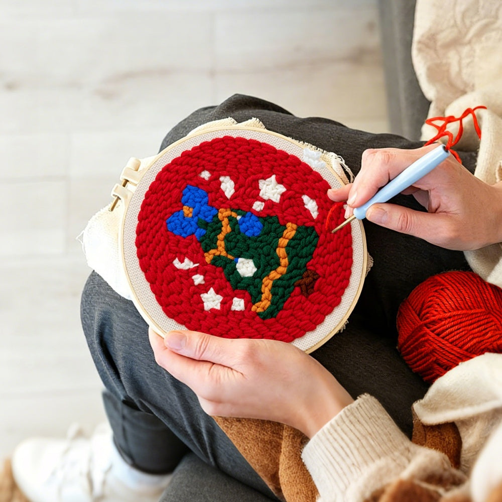 Creating handmade christmas tree with snowflakes unch needle artwork