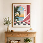 Finished coastal arch sunset view cross stitch artwork displayed as home decor