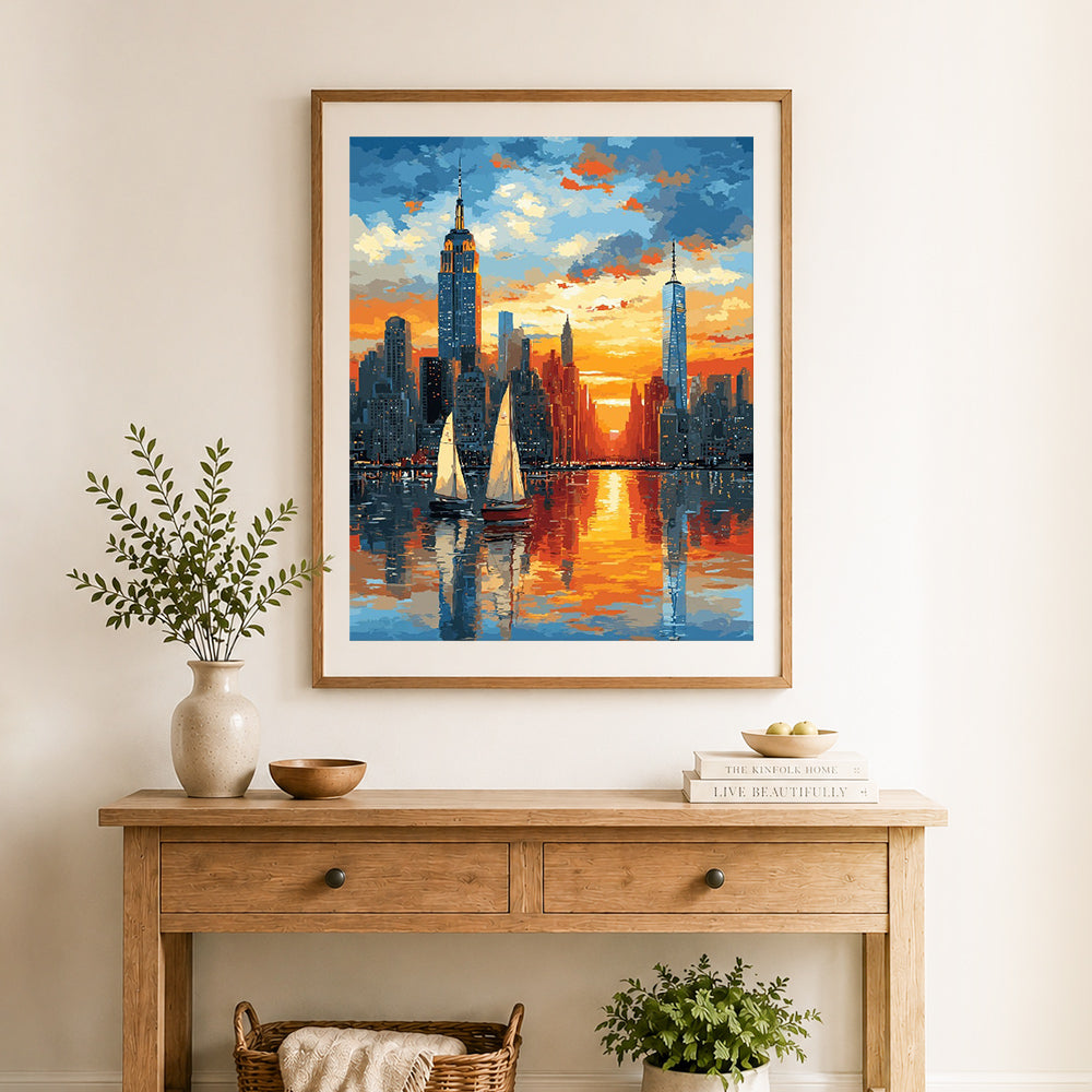 Finished coastal sunset city view cross stitch artwork displayed as home decor
