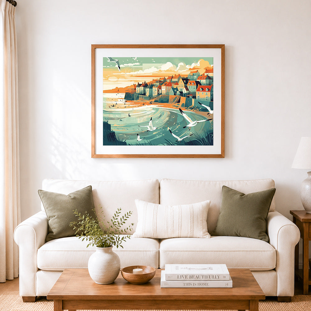 Finished coastal town summer view cross stitch artwork displayed as home decor