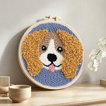 Cocker spaniel punch needle artwork displayed on a table