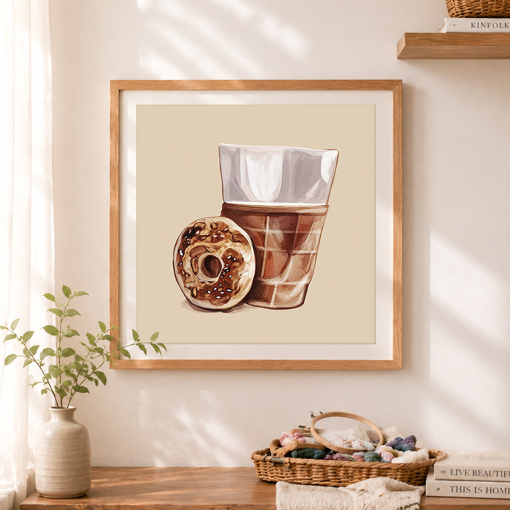 Finished coffee and bagel art cross stitch artwork displayed as home decor