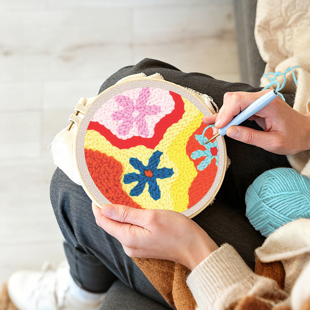 Creating handmade colorful abstract flowers punch needle artwork