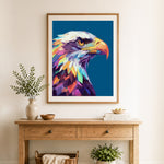 Finished colorful bald eagle art cross stitch artwork displayed as home decor