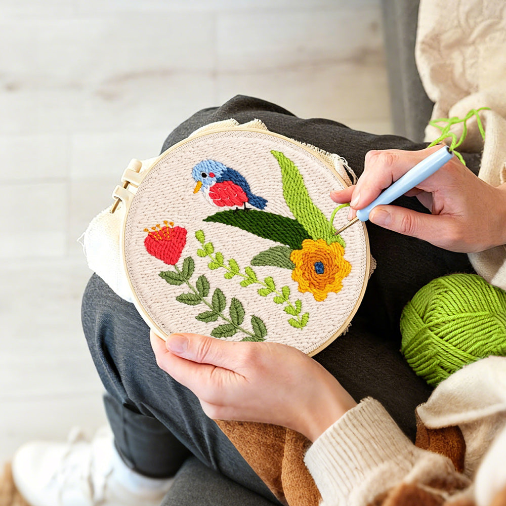 Creating handmade colorful bird and flowers punch needle artwork