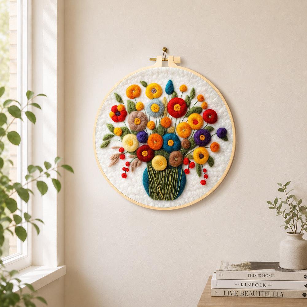 Colorful bouquet with berries needle felt wall art displayed in a bright home interior
