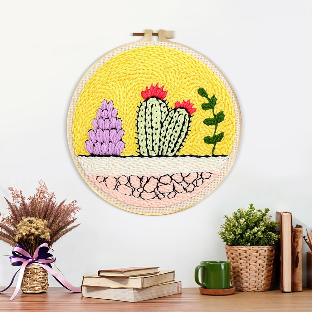 Finished colorful cacti garden artwork displayed on a wall