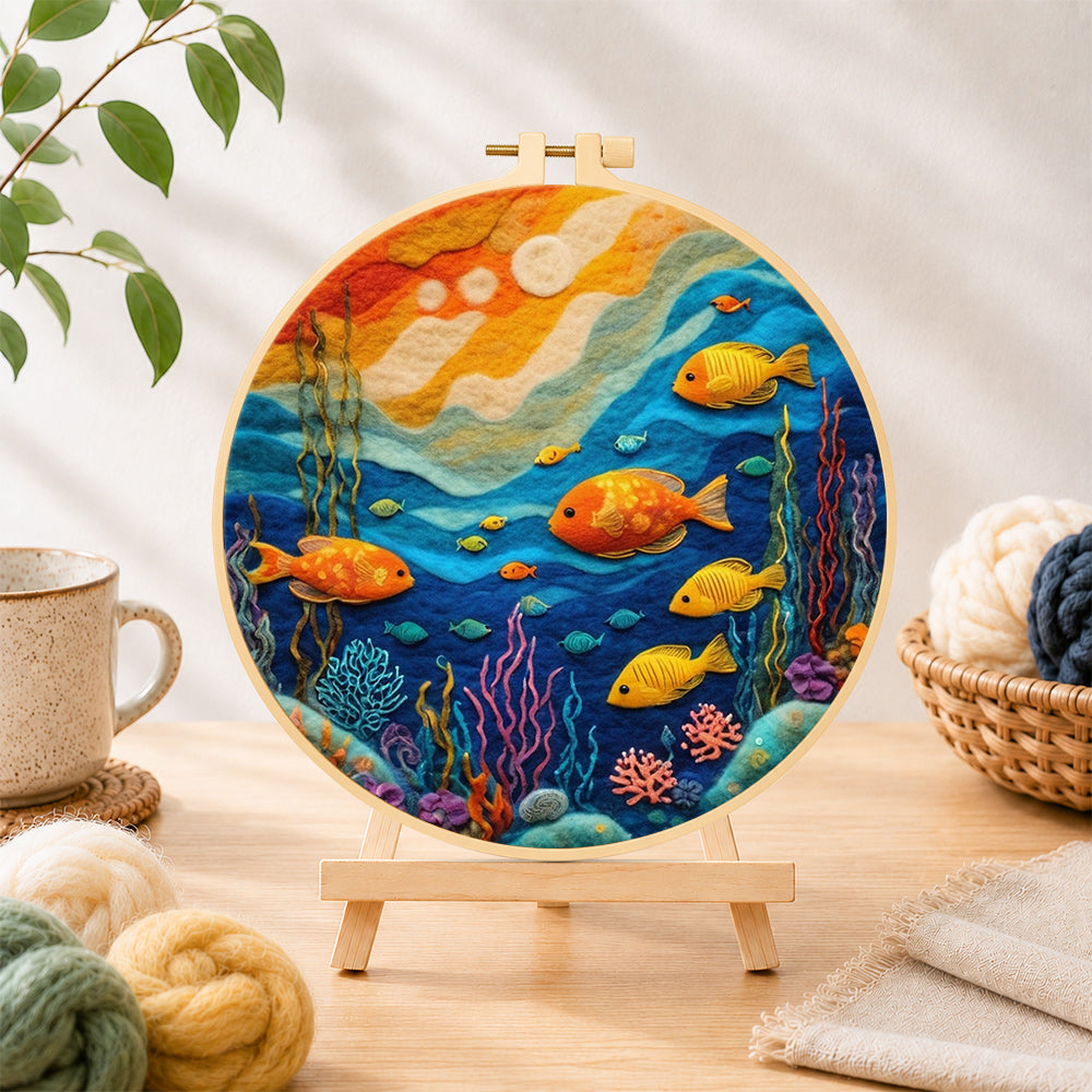 Finished colorful deep-sea fish needle felting displayed on a wooden easel
