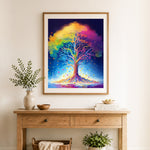 Finished colorful enchanted tree cross stitch artwork displayed as home decor