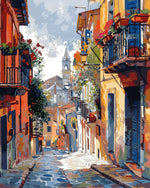 Colorful european village street with church cross stitch kit for beginners