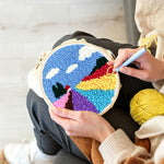 Creating handmade colorful floral field punch needle artwork
