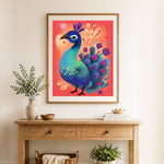 Finished colorful floral peacock cross stitch artwork displayed as home decor