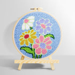 Colorful flowers on blue-background punch needle kit for beginners