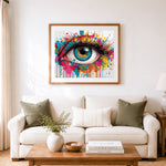 Finished colorful graffiti eye art cross stitch artwork displayed as home decor