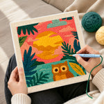 Creating handmade colorful jungle sunset with owl punch needle artwork