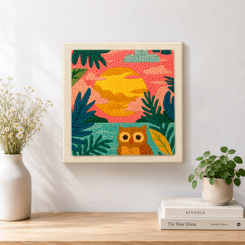 Finished colorful jungle sunset with owl artwork displayed on a wall