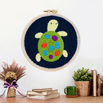 Finished colorful little turtle artwork displayed on a wall