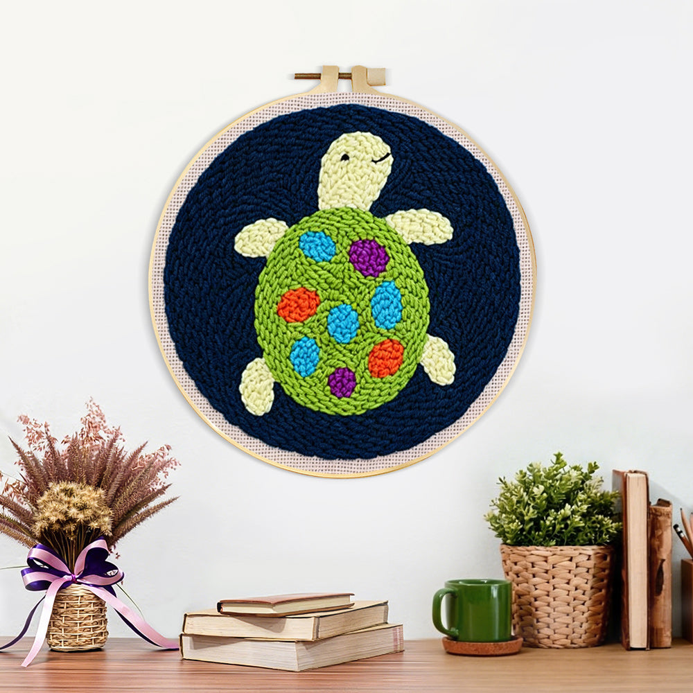 Finished colorful little turtle artwork displayed on a wall