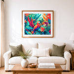 Finished colorful macaw in tropical foliage cross stitch artwork displayed as home decor