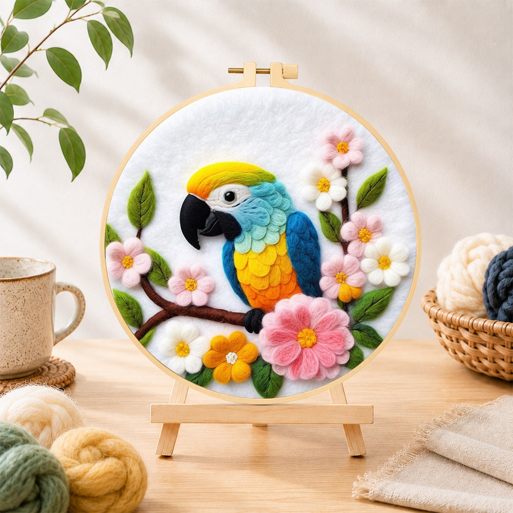 Finished colorful macaw parrot with flowers needle felting displayed on a wooden easel
