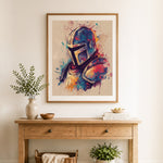 Finished colorful mandalorian helmet cross stitch artwork displayed as home decor