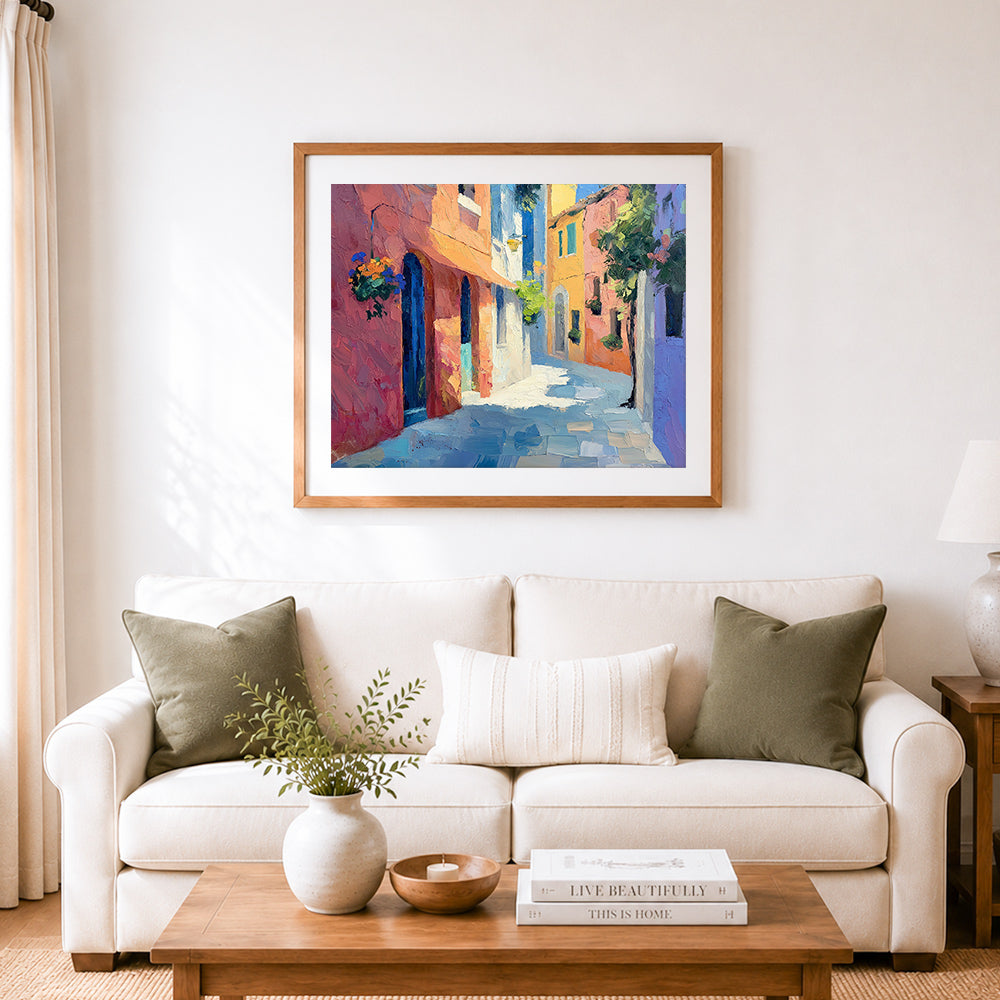 Finished colorful mediterranean alley cross stitch artwork displayed as home decor
