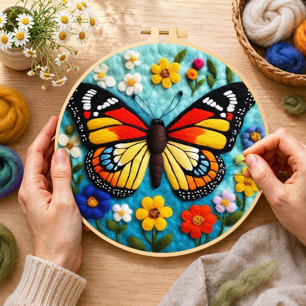 Creating the colorful monarch butterfly and wildflowers wool painting by hand with a felting needle