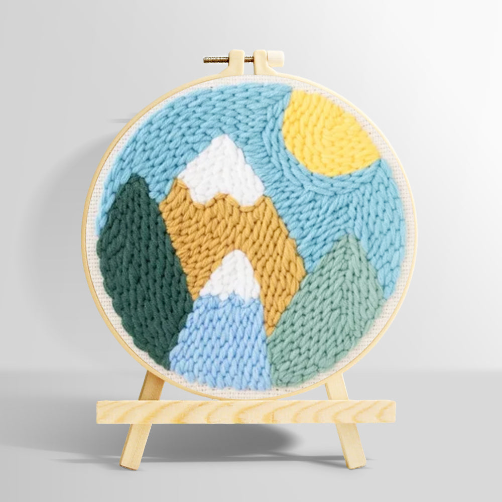 Colorful mountain landscape with sun punch needle kit for beginners