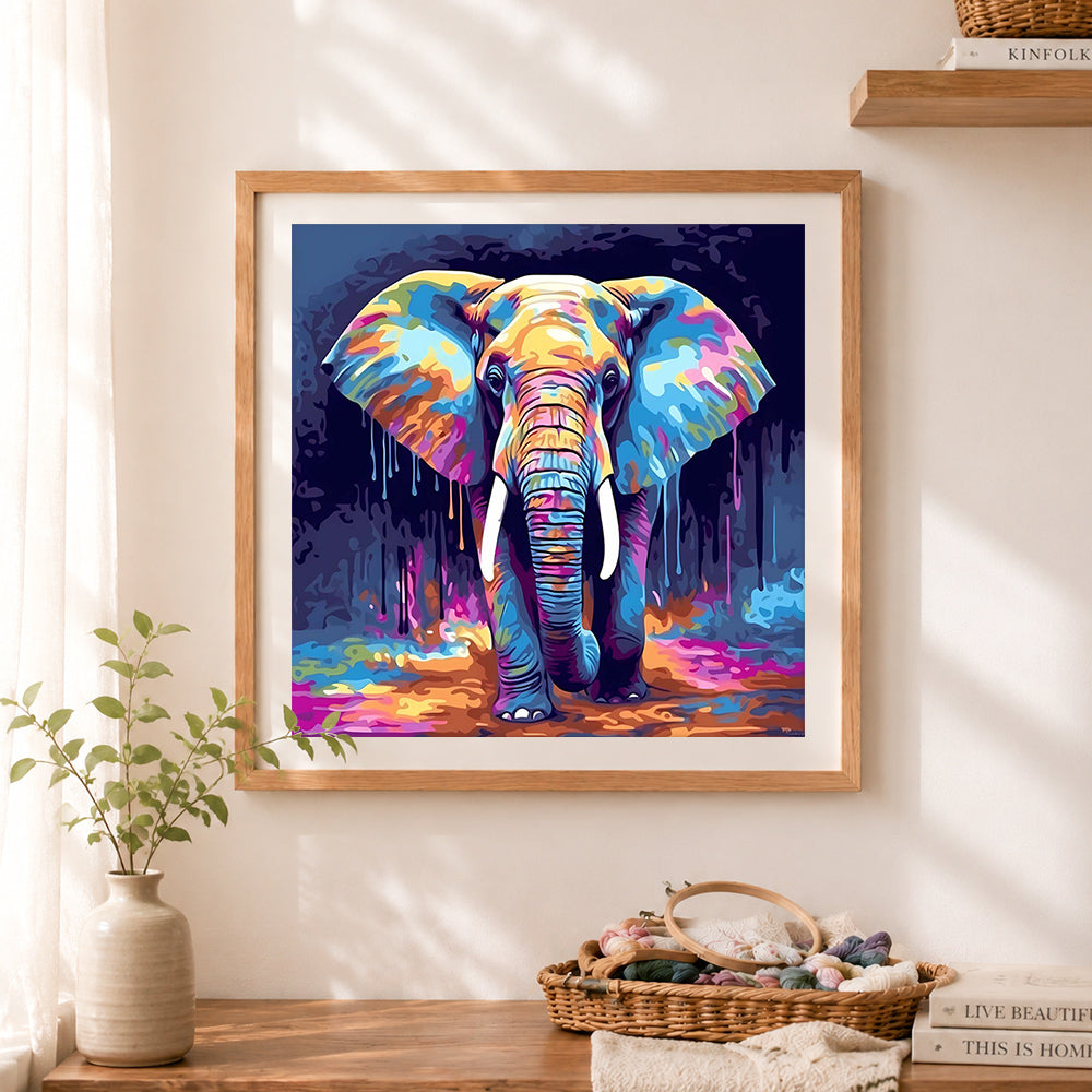 Finished colorful pop‑art elephant cross stitch artwork displayed as home decor
