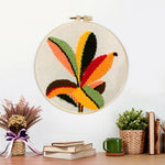 Finished colorful radial leaves artwork displayed on a wall