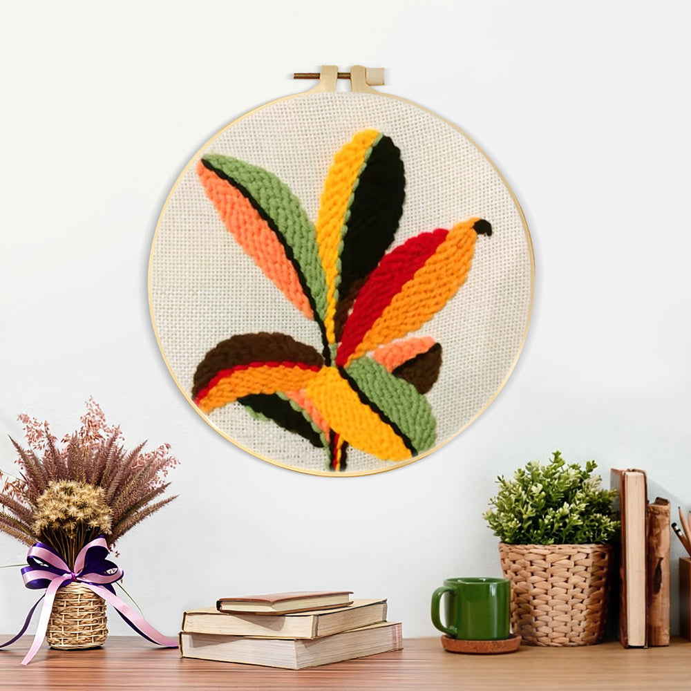 Finished colorful radial leaves artwork displayed on a wall