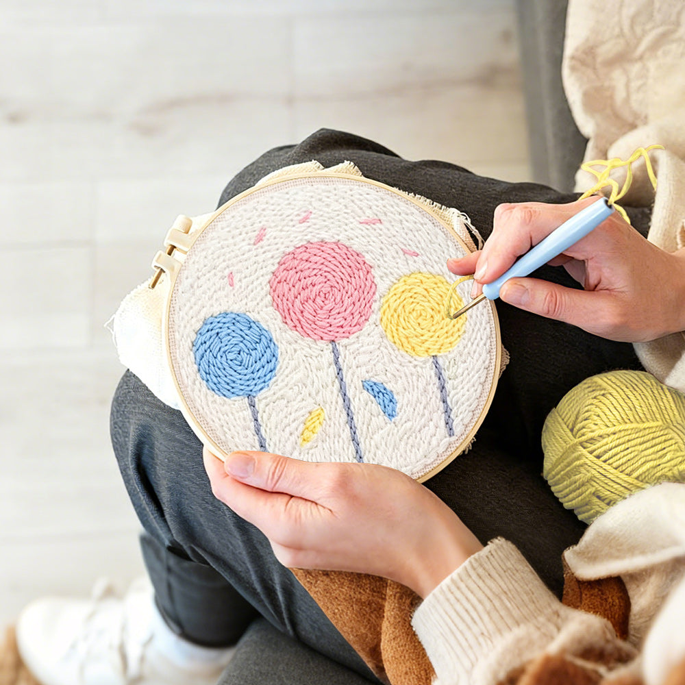 Creating handmade colorful round flowers punch needle artwork