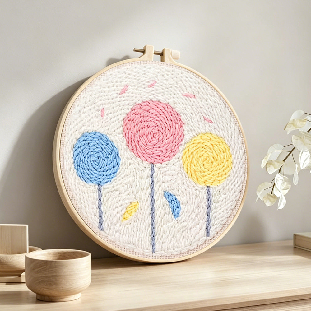 Colorful round flowers punch needle artwork displayed on a table
