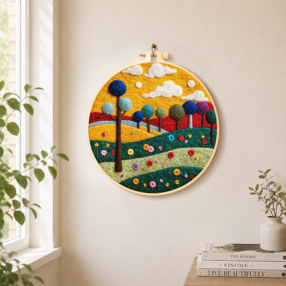 Colorful round trees on whimsical hills needle felt wall art displayed in a bright home interior