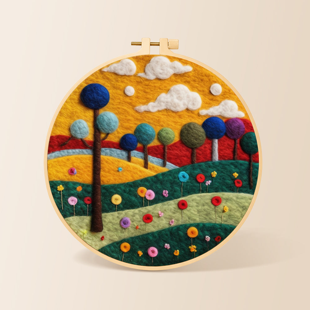 Colorful round trees on whimsical hills needle felting kit for beginners with a round wooden frame