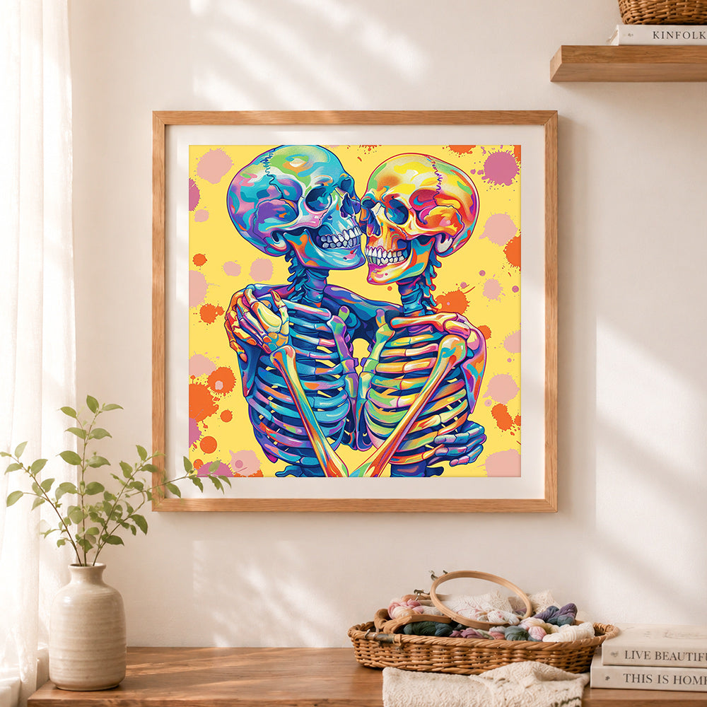 Finished colorful skeleton love cross stitch artwork displayed as home decor
