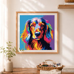 Finished colorful splash spaniel cross stitch artwork displayed as home decor