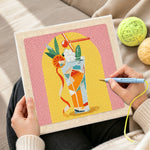 Creating handmade colorful tall cocktail punch needle artwork