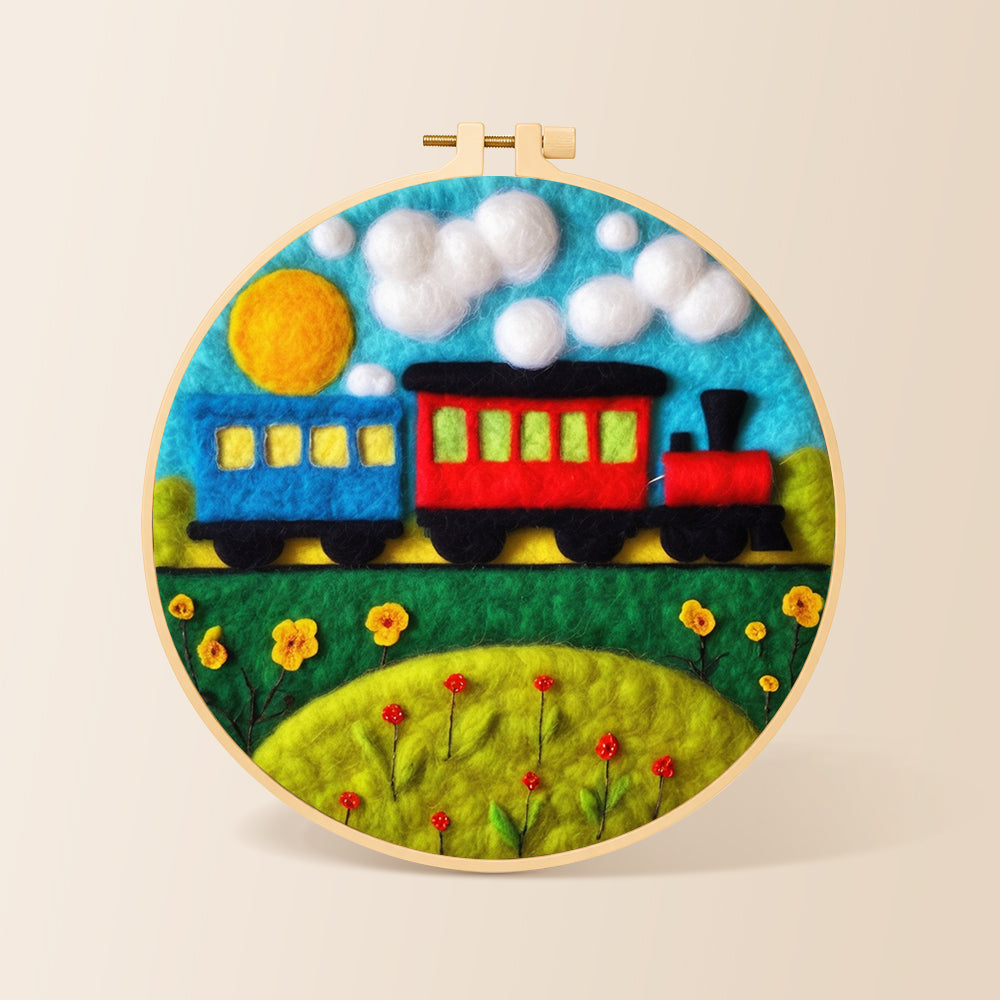 Colorful train on grass needle felting kit for beginners with a round wooden frame