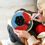 Creating handmade colorful tree with red beads punch needle artwork