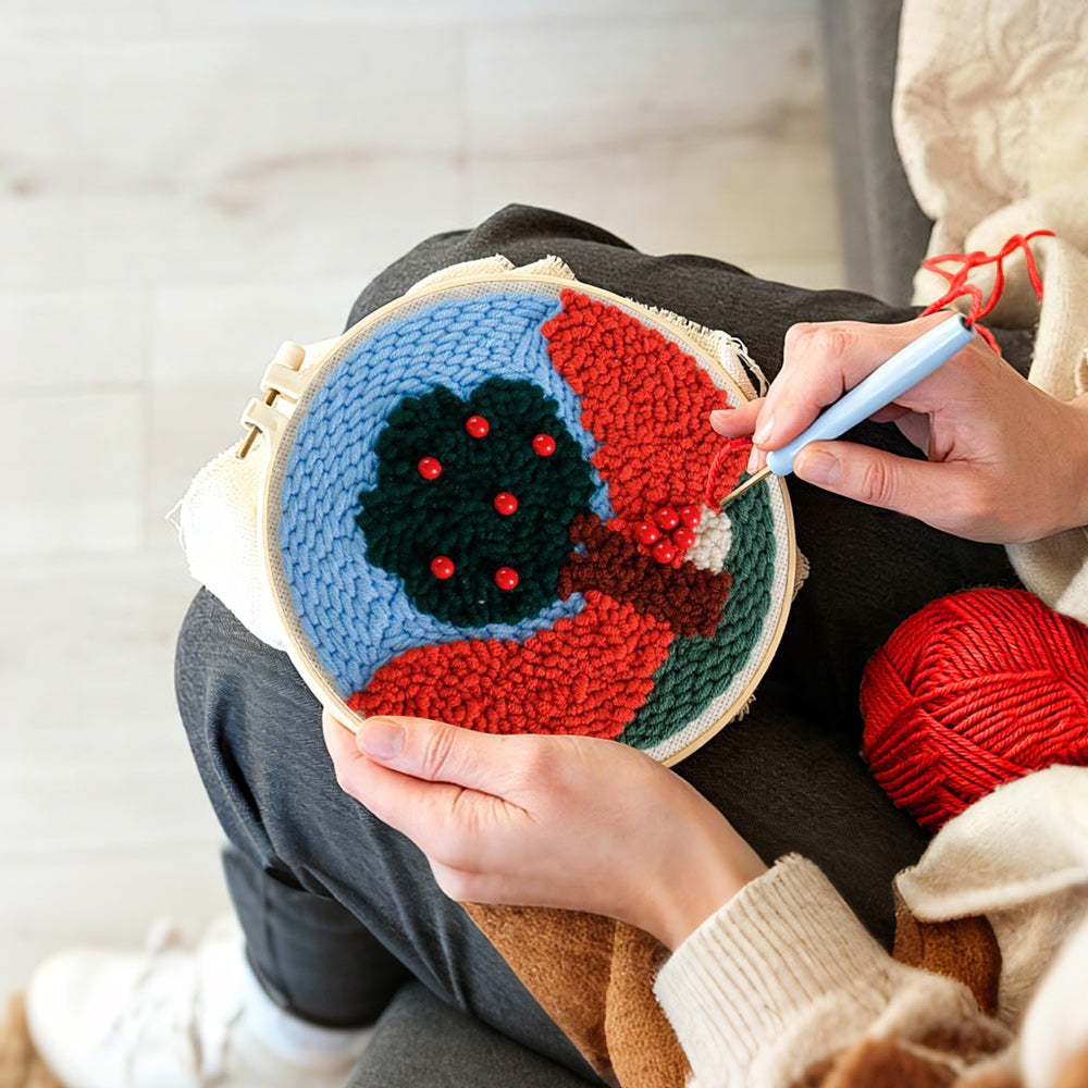 Creating handmade colorful tree with red beads punch needle artwork