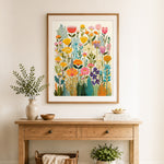 Finished colorful tulips and wildflowers cross stitch artwork displayed as home decor