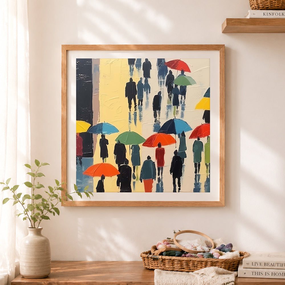 Finished colorful umbrellas in the rain cross stitch artwork displayed as home decor