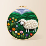 Colorful wildflower meadow with a sheep needle felting kit for beginners with a round wooden frame