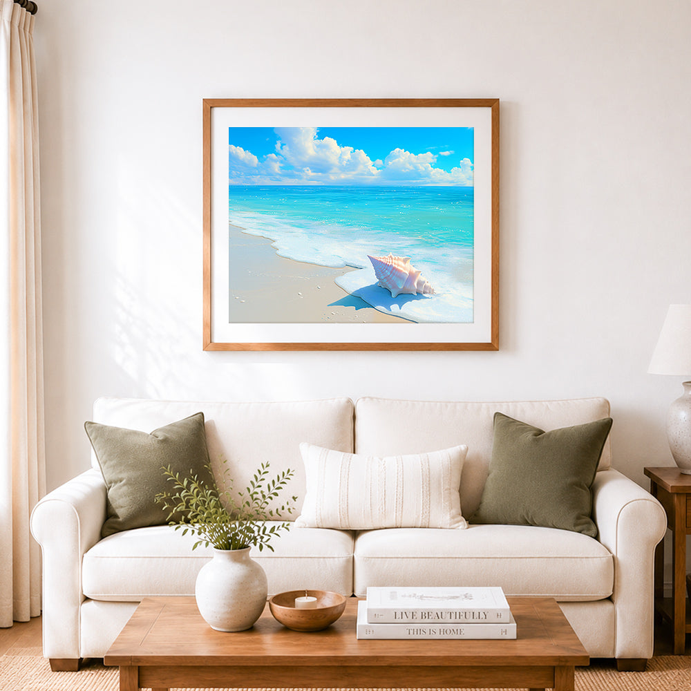 Finished conch shell by gentle waves cross stitch artwork displayed as home decor