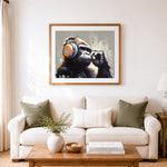 Finished cool gorilla wearing headphones cross stitch artwork displayed as home decor