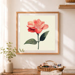 Finished coral camellia botanical art cross stitch artwork displayed as home decor