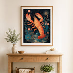 Finished coral lobster art cross stitch artwork displayed as home decor