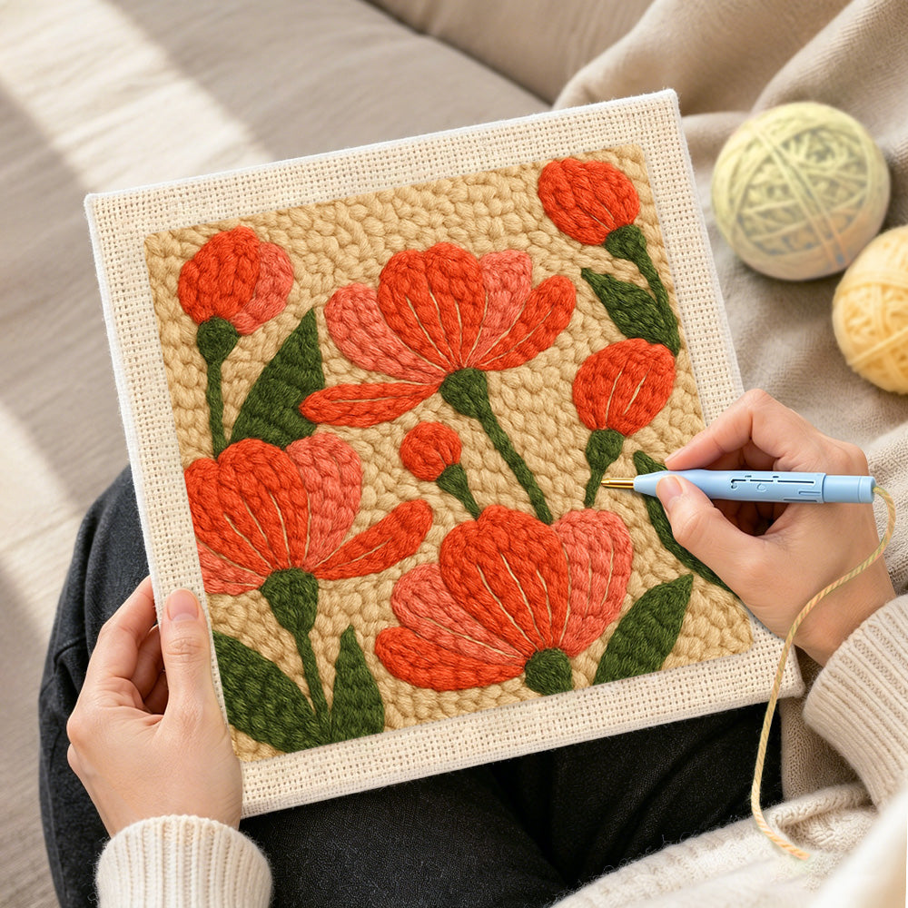Creating handmade coral pink flowers punch needle artwork