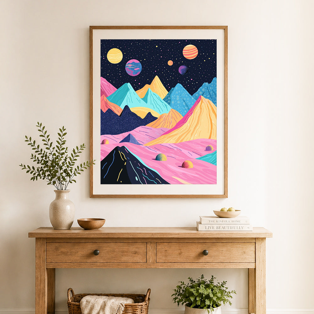 Finished cosmic colorful mountain range cross stitch artwork displayed as home decor